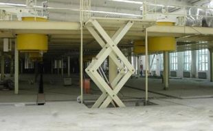 优化旅客流程:液压登车桥与安全检查的衔接